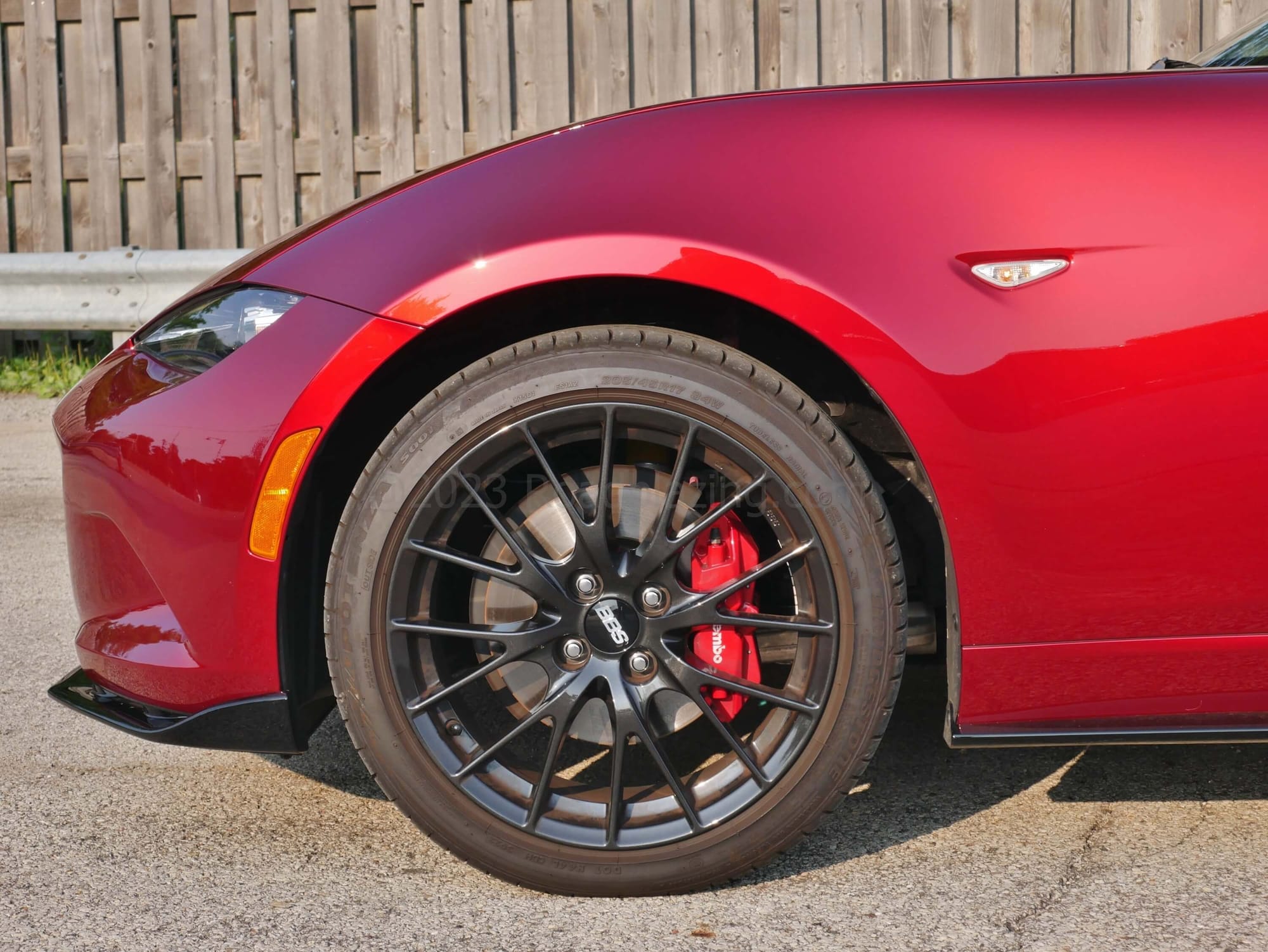 2023 Mazda MX-5 Miata RF Club: 4 piston fixed Brembo front brake calipers and lighter forged BBS 17" wheels are part of the Club upfitting.