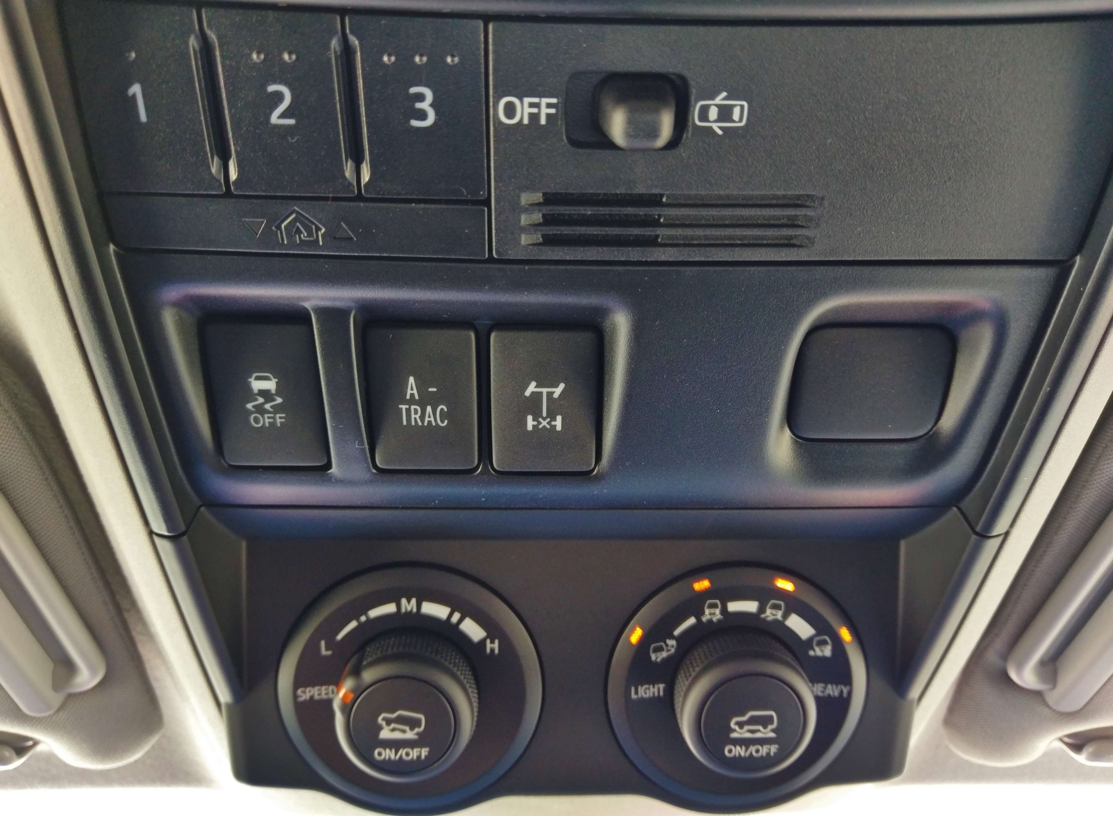 2017 Toyota 4Runner TRD Pro: Overhead control panel: A-TRAC, is basically variable speed cruise control for steep off road descents; Lower right dial adjusts MultiTerrain off-road settings