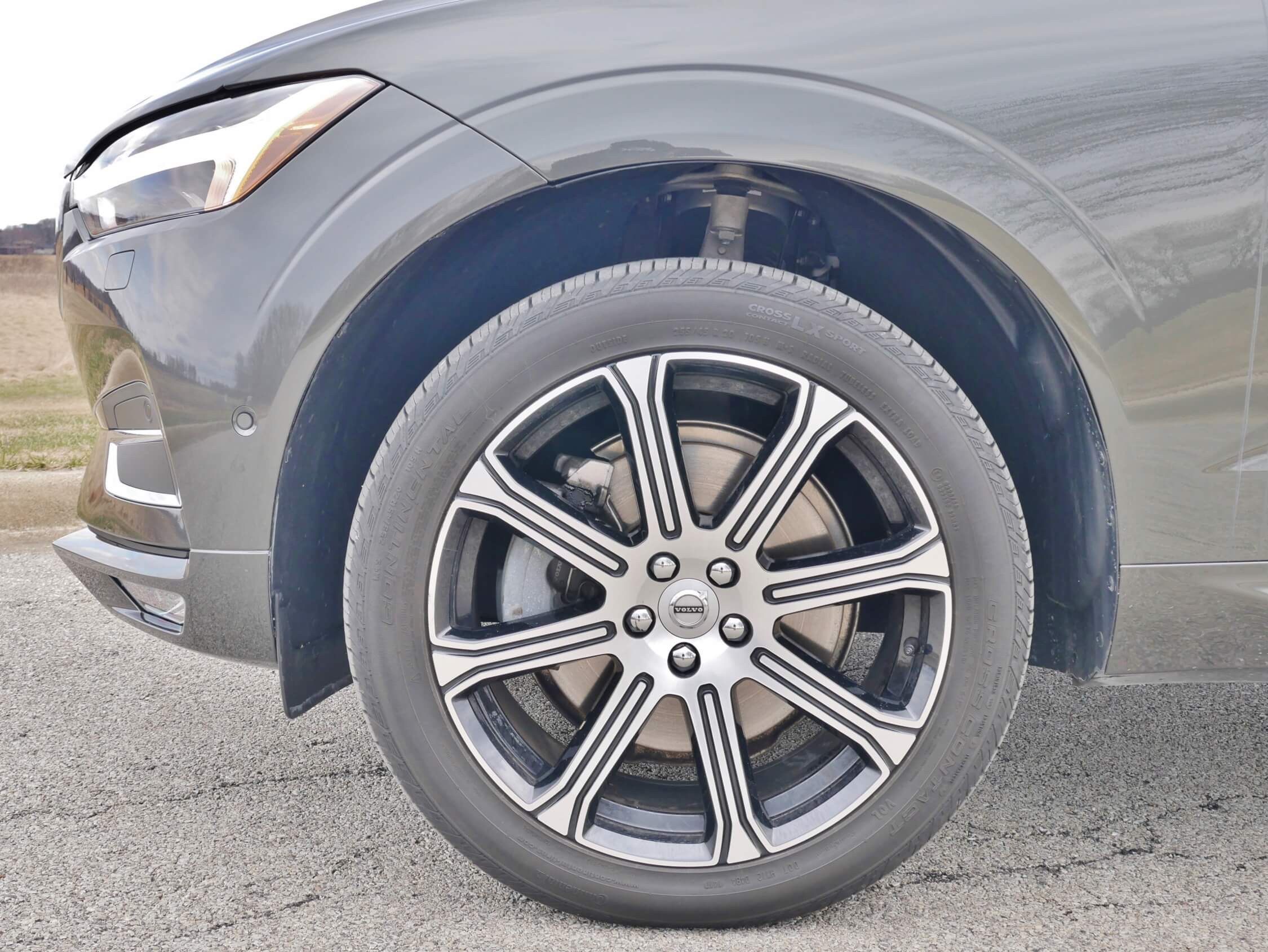 2018 Volvo XC60 T6 AWD Inscription: Optional Air Springs needed to absorb 20" alloy impacts and impart plaint roll resistance. Hefty steering suffers from vagueness at speed. Good initial friction frustrated by hard pedal at end of travel.
