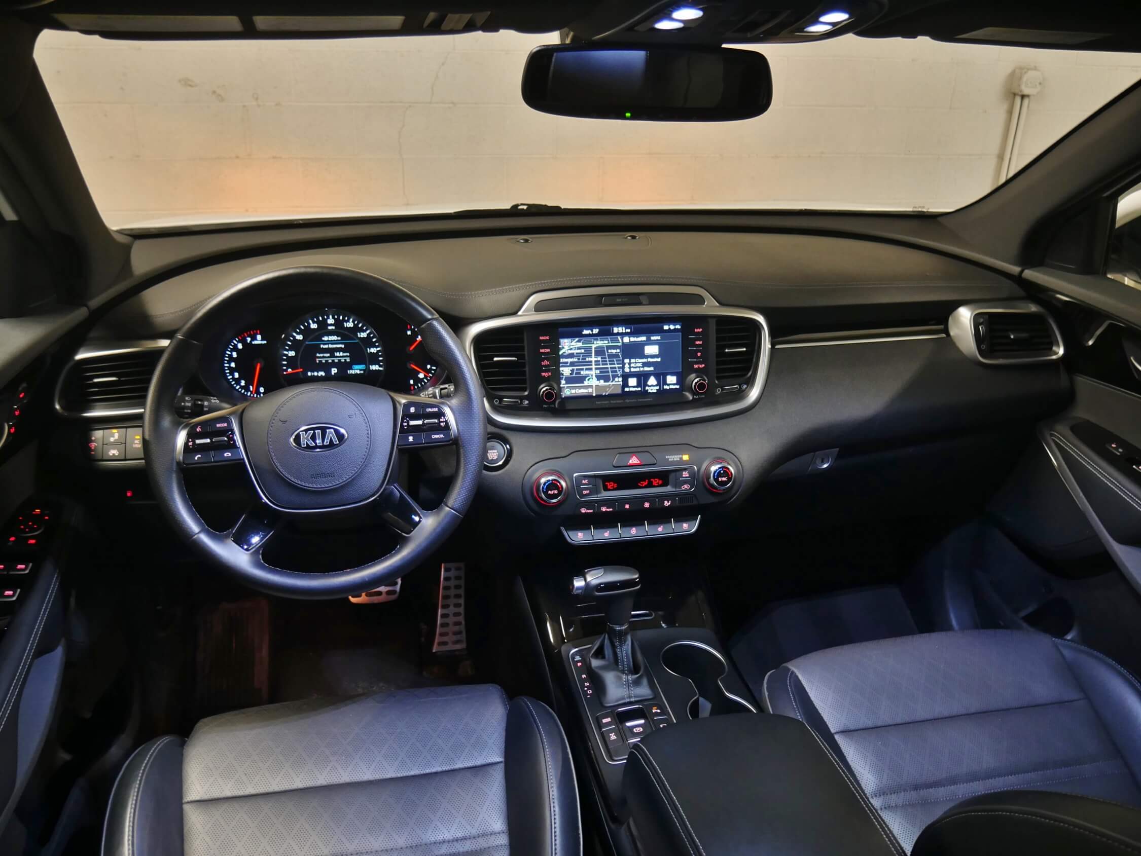 2019 Kia Sorento SXL AWD: Cohesively arranged cockpit w/ piano black matte metal accents, contrast stitched soft materials, ELD analog instruments and 8.0" upper center mid dash touch LCD infotainment navigation screen.