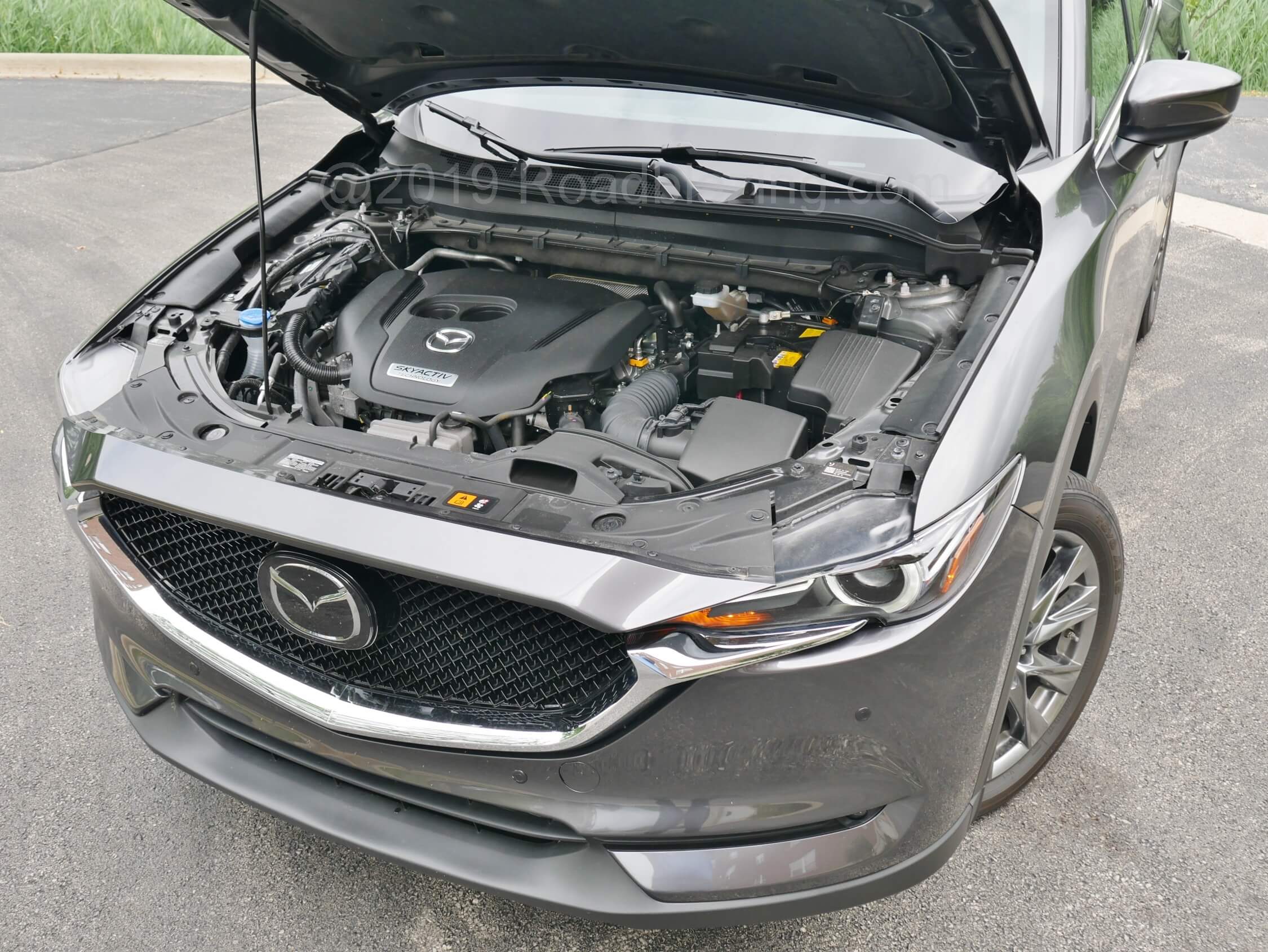 2019 Mazda CX-5 Signature AWD: Not wanting to be revved as high as the Touring's naturally aspirated engine, the turbocharged DOHC gas I-4's 310 lb-ft of motorway charging twist is impressive if subtle. With standard up to 50:50 AWD split, this is the quickest Mazda not called Miata. Fuel economy = 25 mpg