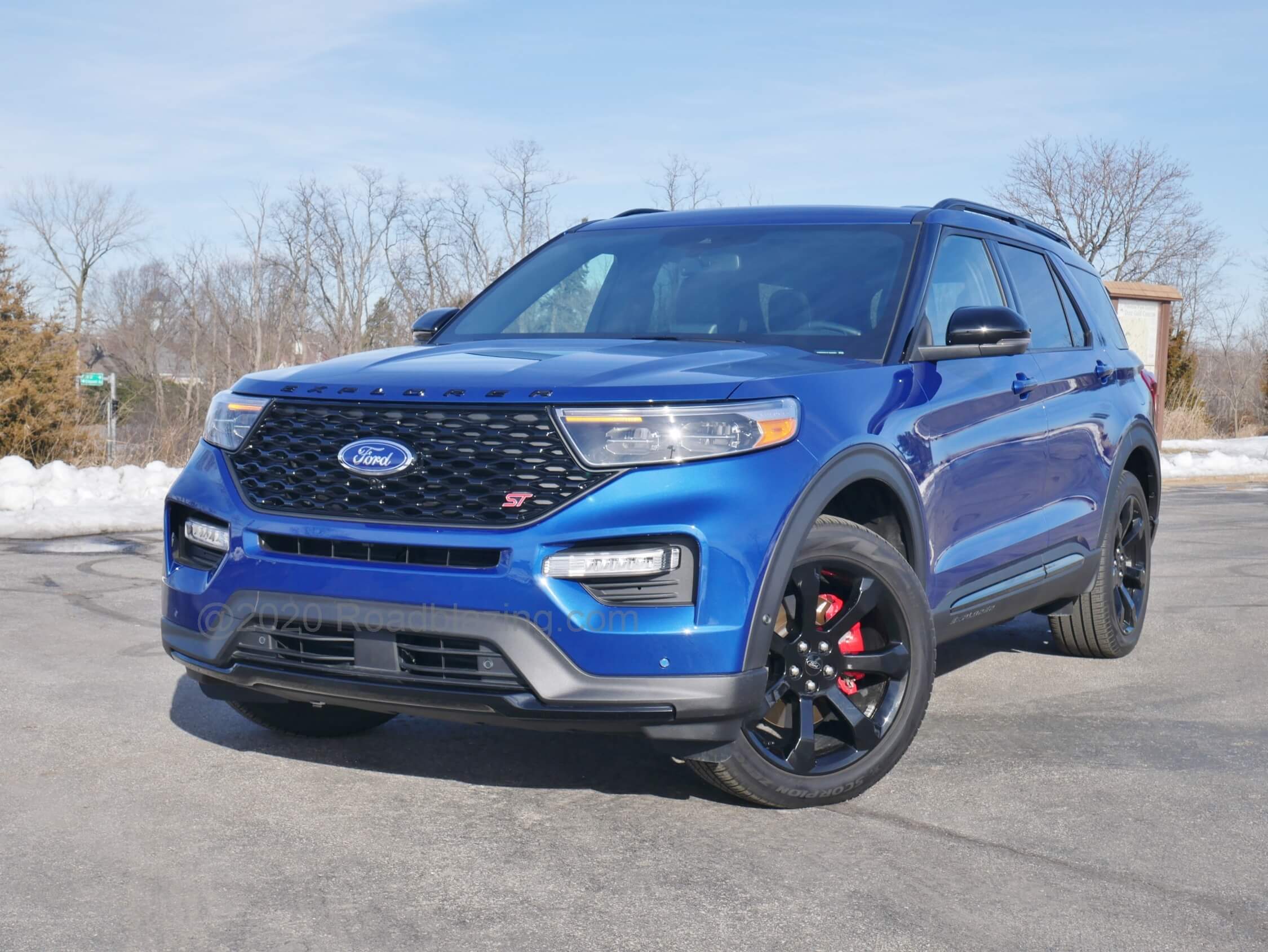 2020 Ford Explorer ST: With "EXPLORER" spelled boldly on the hood overhang, the front treatment darkened drawn but muscular treatment conveys intimidation.
