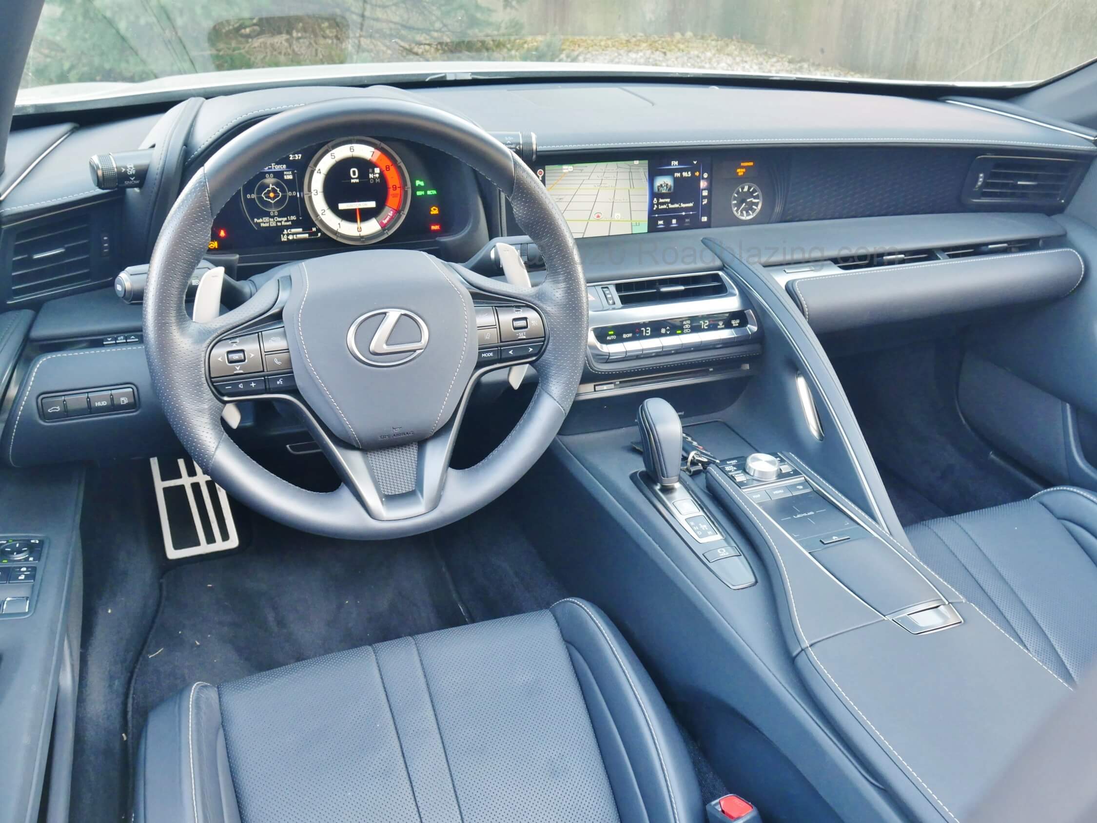 2021 Lexus LC 500 Convertible: subtle kind of bespoke cockpit with racy ELD mono-gauge, smooth cross stitched soft leathered or brushed metallic surfaces throughout