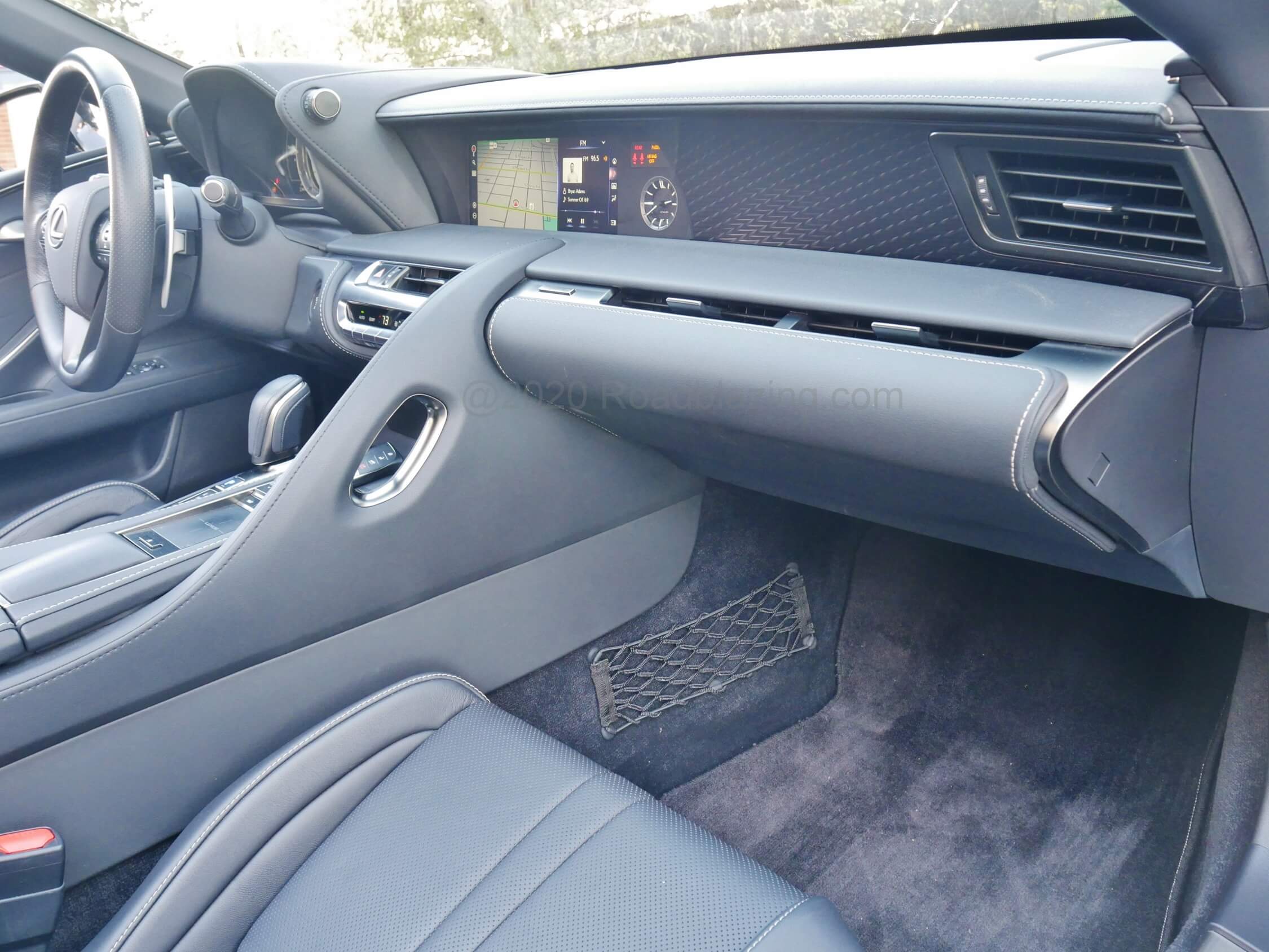 2021 Lexus LC 500 Convertible: grab handles and illuminated carbon fiber dash weave greet front passenger