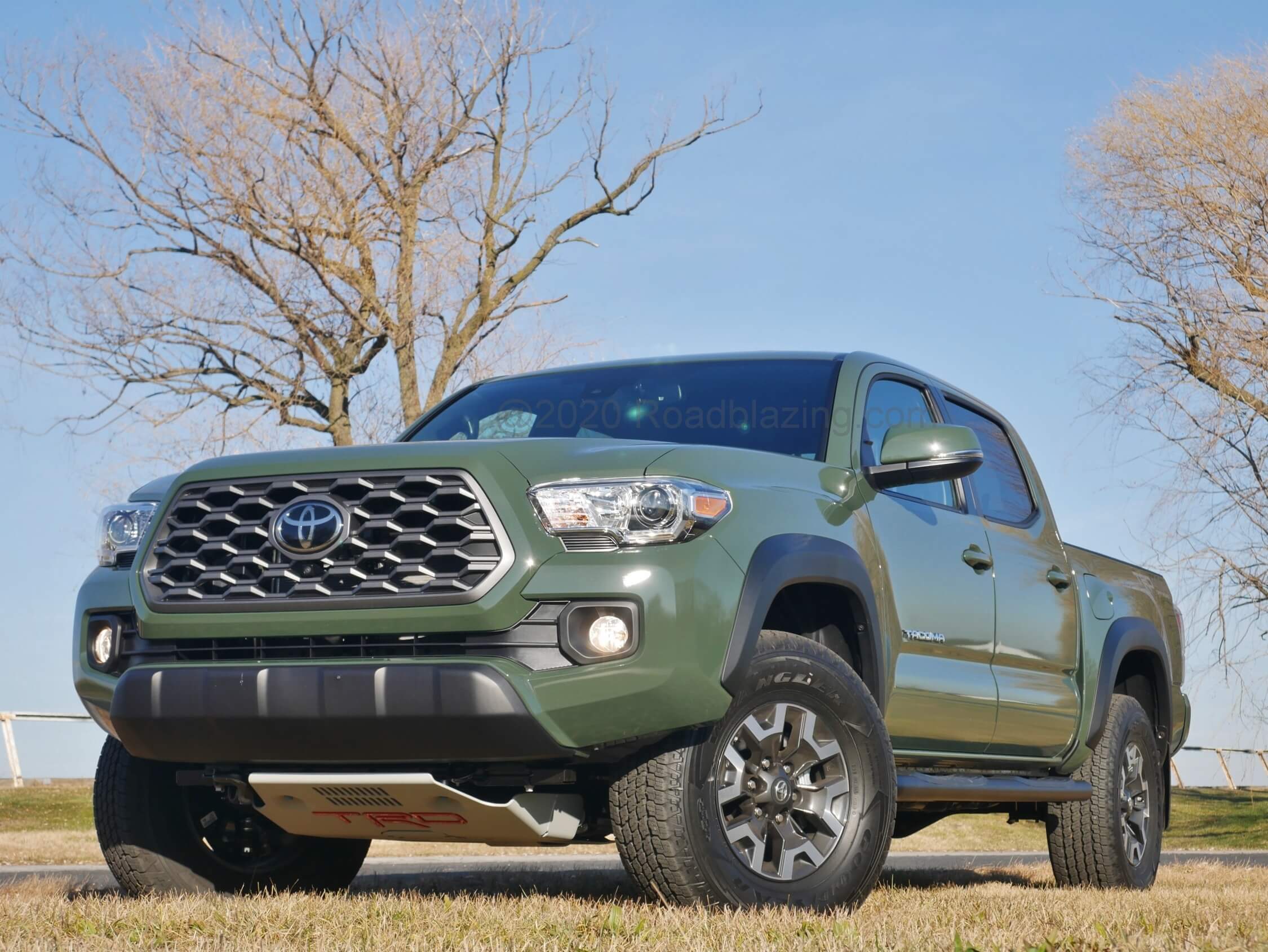 2021 Toyota Tacoma TRD Off Road: "C" LED DRL's encapsulate the swept back headlamps and grilles feature new lattice work.