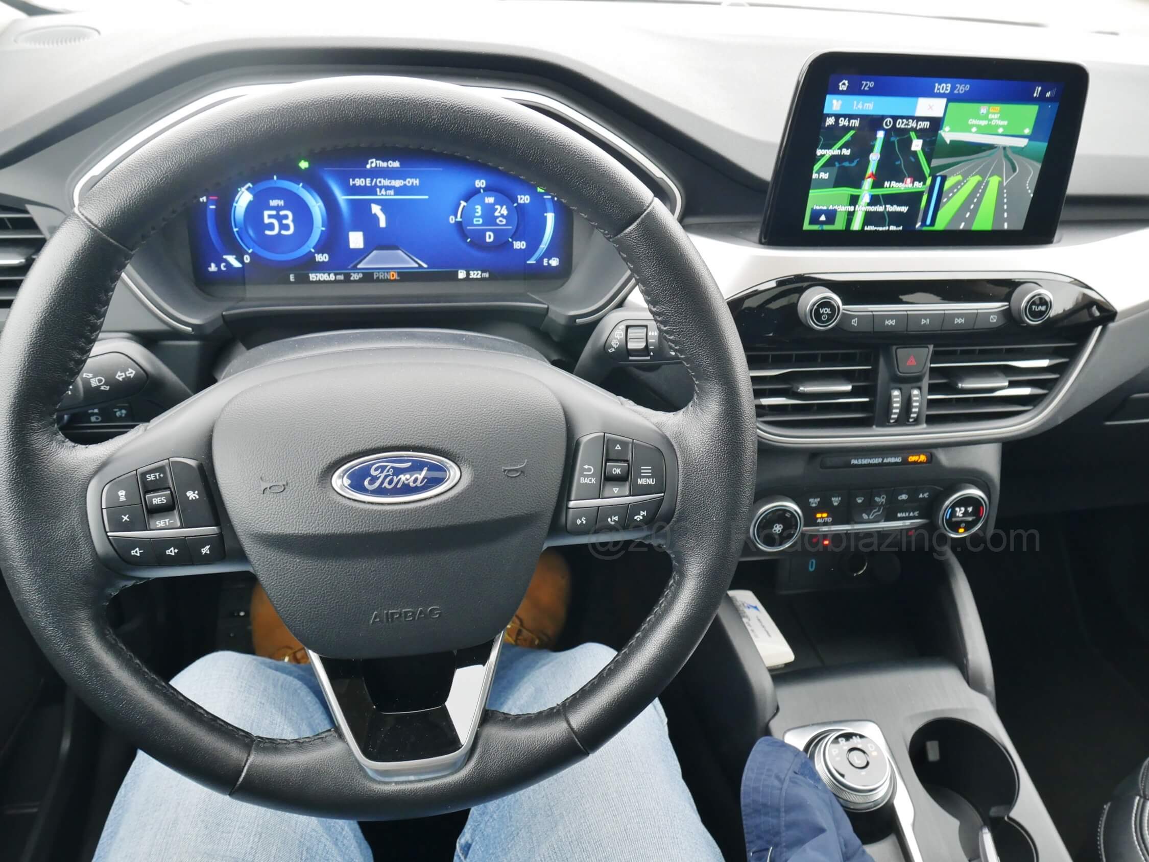 2020 Ford Escape SE Hybrid AWD: cockpit while driving w/ native Navigation displayed on 8.0" split pane touch LCD screen