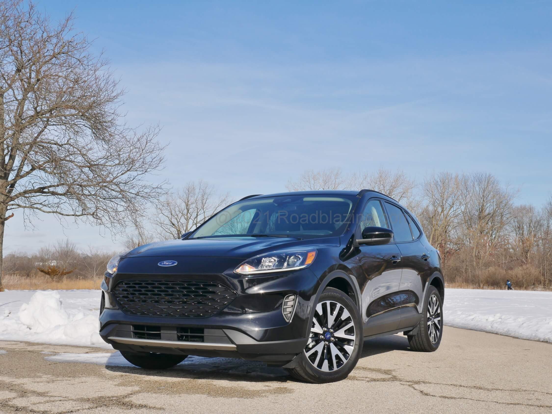 2020 Ford Escape SE Hybrid AWD: particularly less truck-like is a grille moved to the bumper and below.