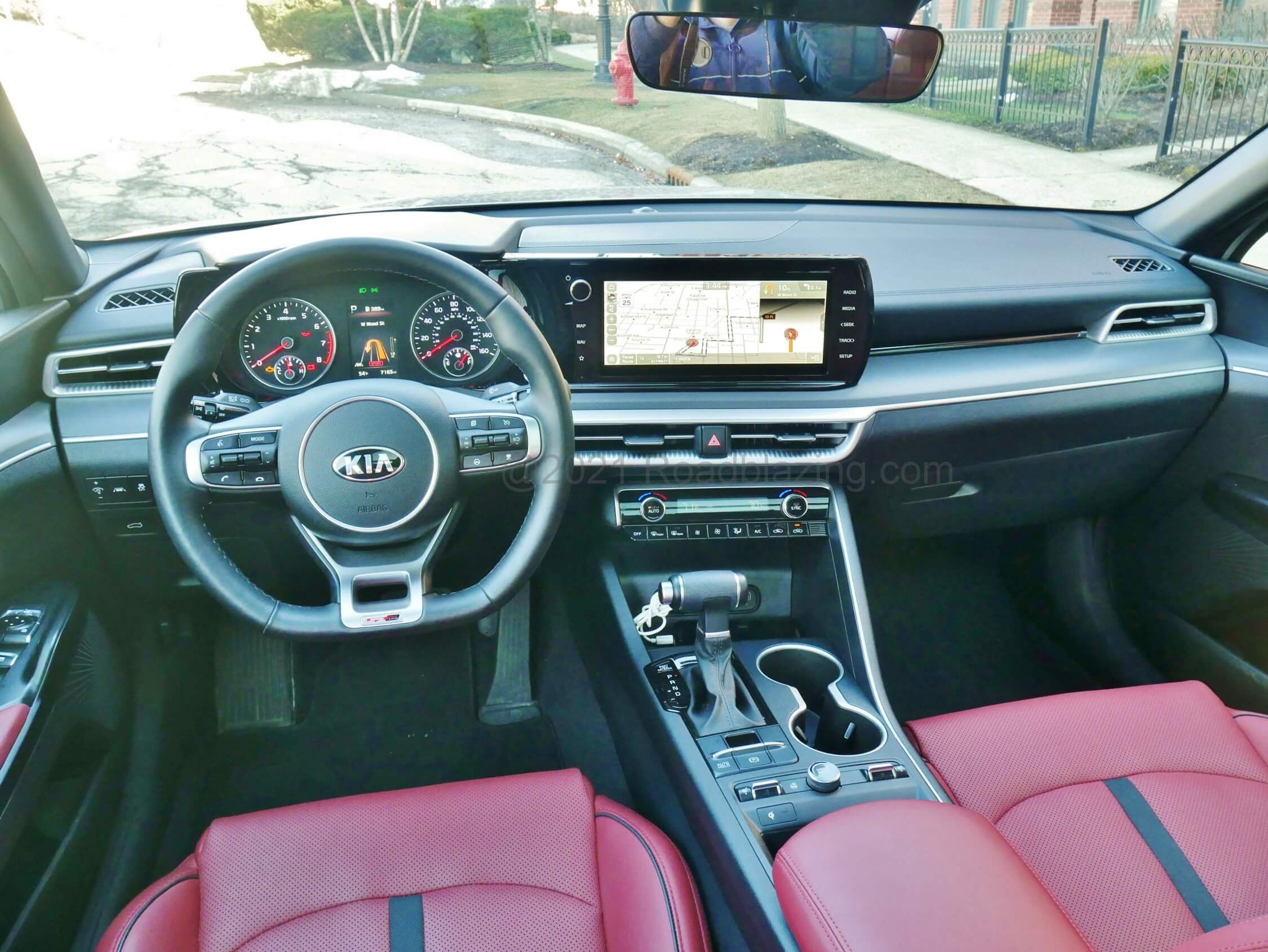 2021 Kia K5 GT-Line AWD: Expansive low cowl Euro styled cockpit with twin analog gauges and 10.25" split screen, swipe touch LCD infotainment display
