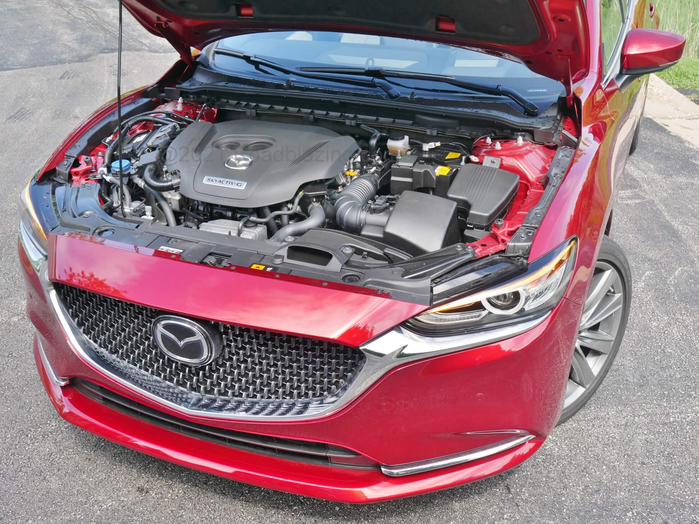 2021 Mazda 6 Signature 2.5T: turbocharged twin-cam 2.5L engine churns out 250 hp / 320 lb-ft torque on super unleaded, still returning 26 combined MPG