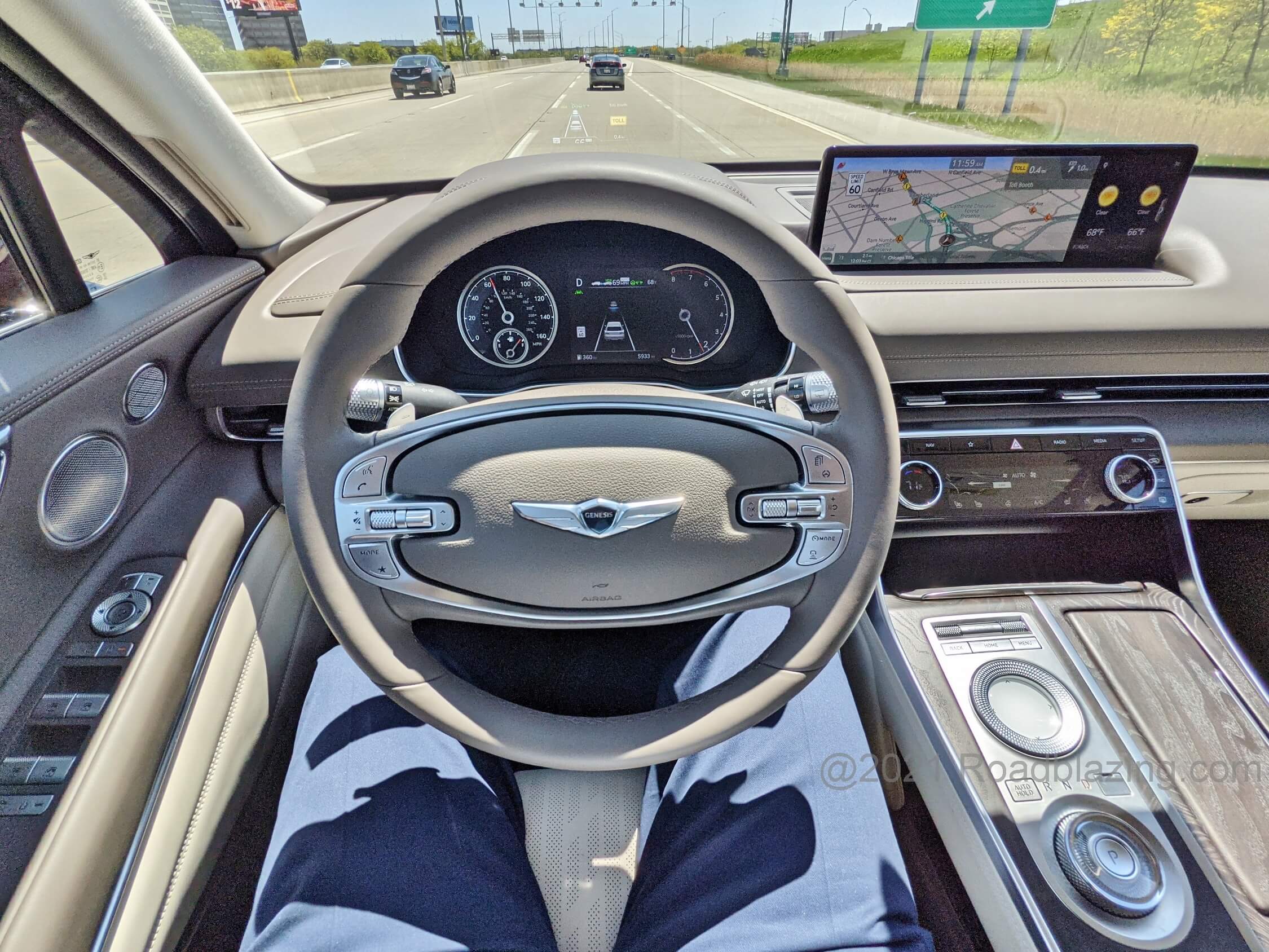 2021 Genesis GV80 2.5T AWD: Effortless interstate cruising made possible by Level 2.0 automated hand-on wheel driver's assist and a large media display and available HUD.