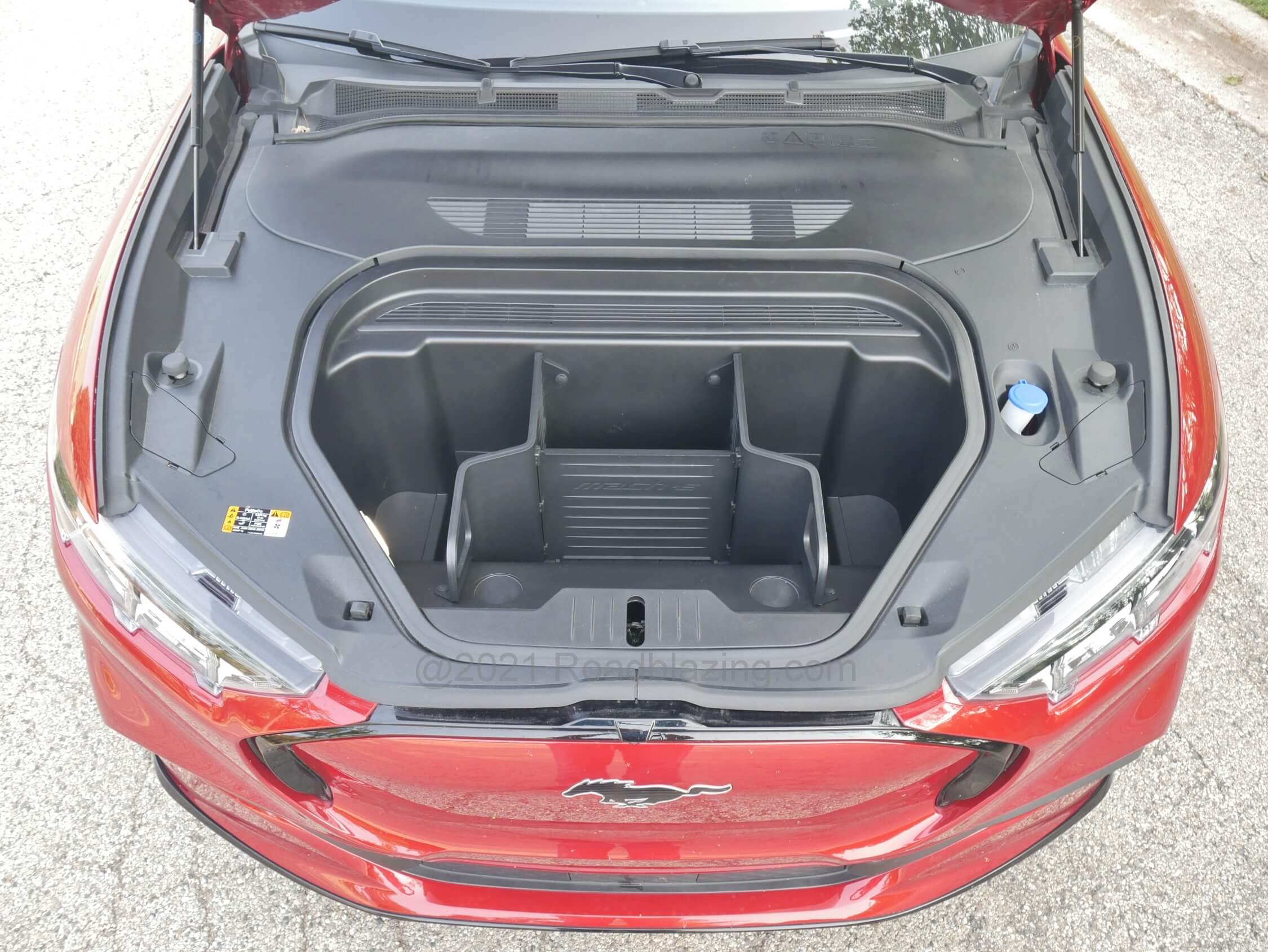 2021 Ford Mustang Mach-E Premium AWD: 4.7 cubic foot trunk in the front = Frunk. Cargo management is fixed but drains