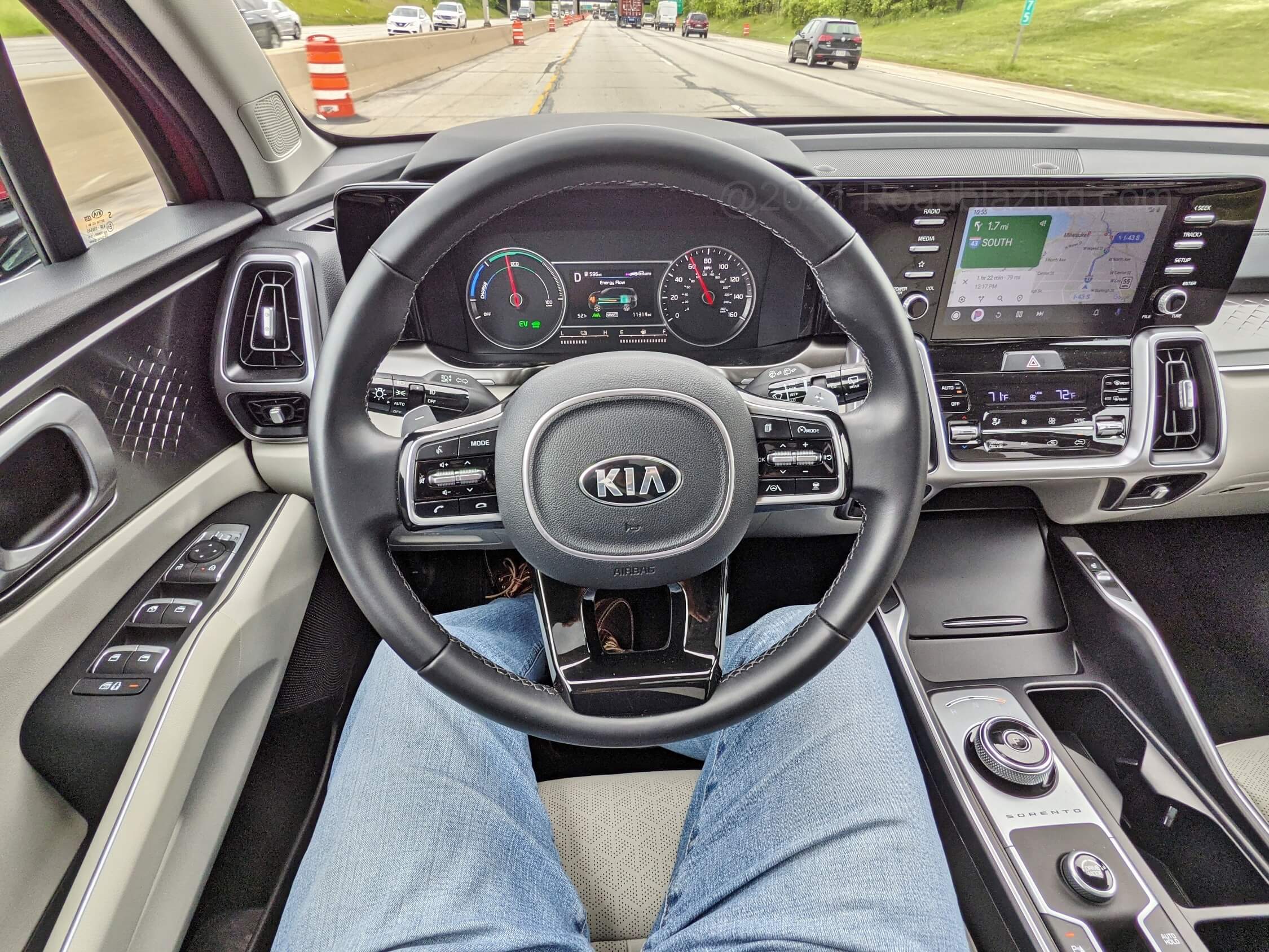 2021 Kia Sorento HEV EX 1.6T Hybrid: driver's view of 4.2" trip display running Android Auto navigation in the 8.0" touch tri-pane LCD media display