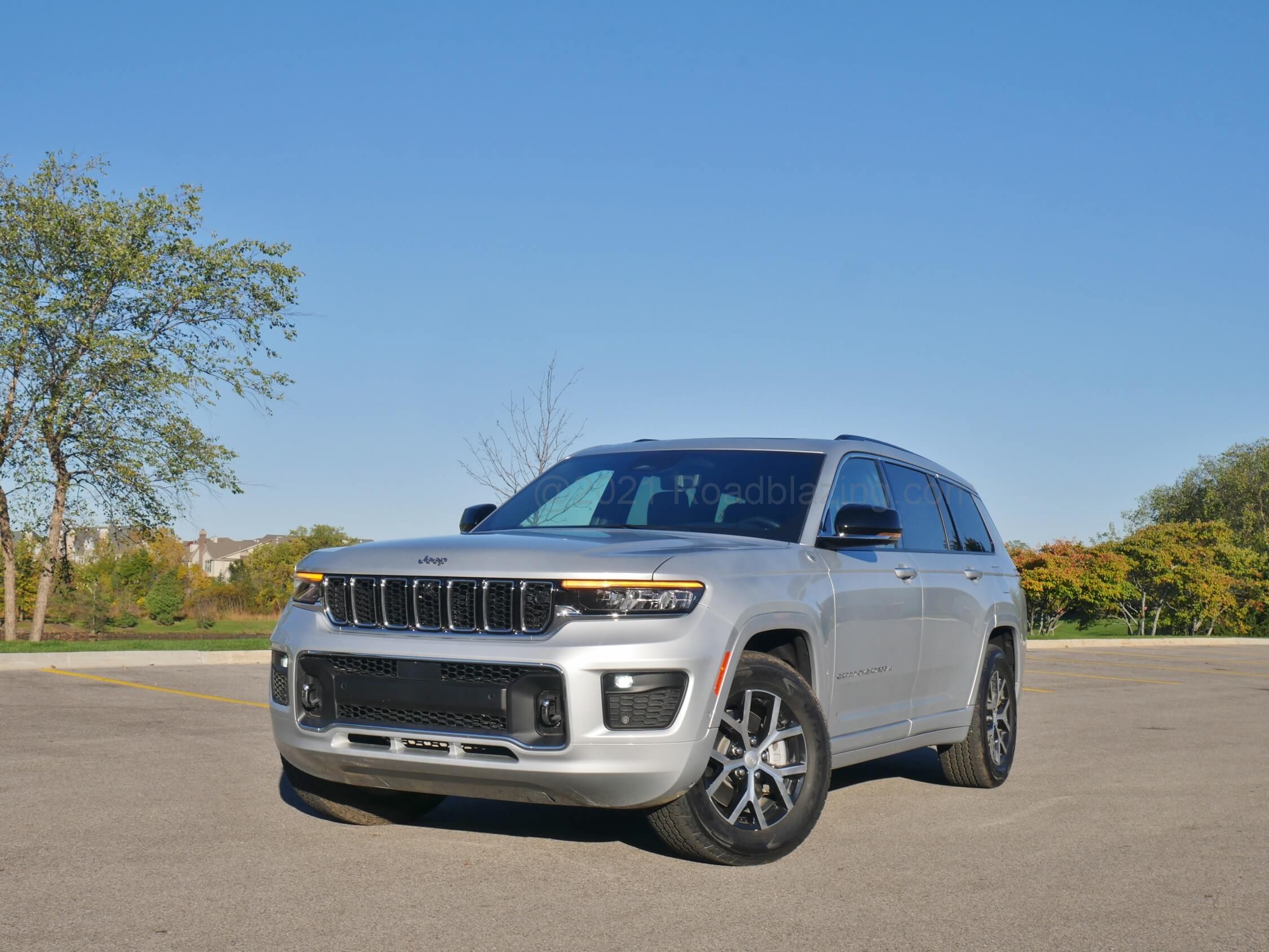 2021 Jeep Grand Cherokee L Overland 5.7L 4x4: wider, thinner trademark six vertical bar grille flows into thinner headlamp housings, emphasizing deep lower fascia