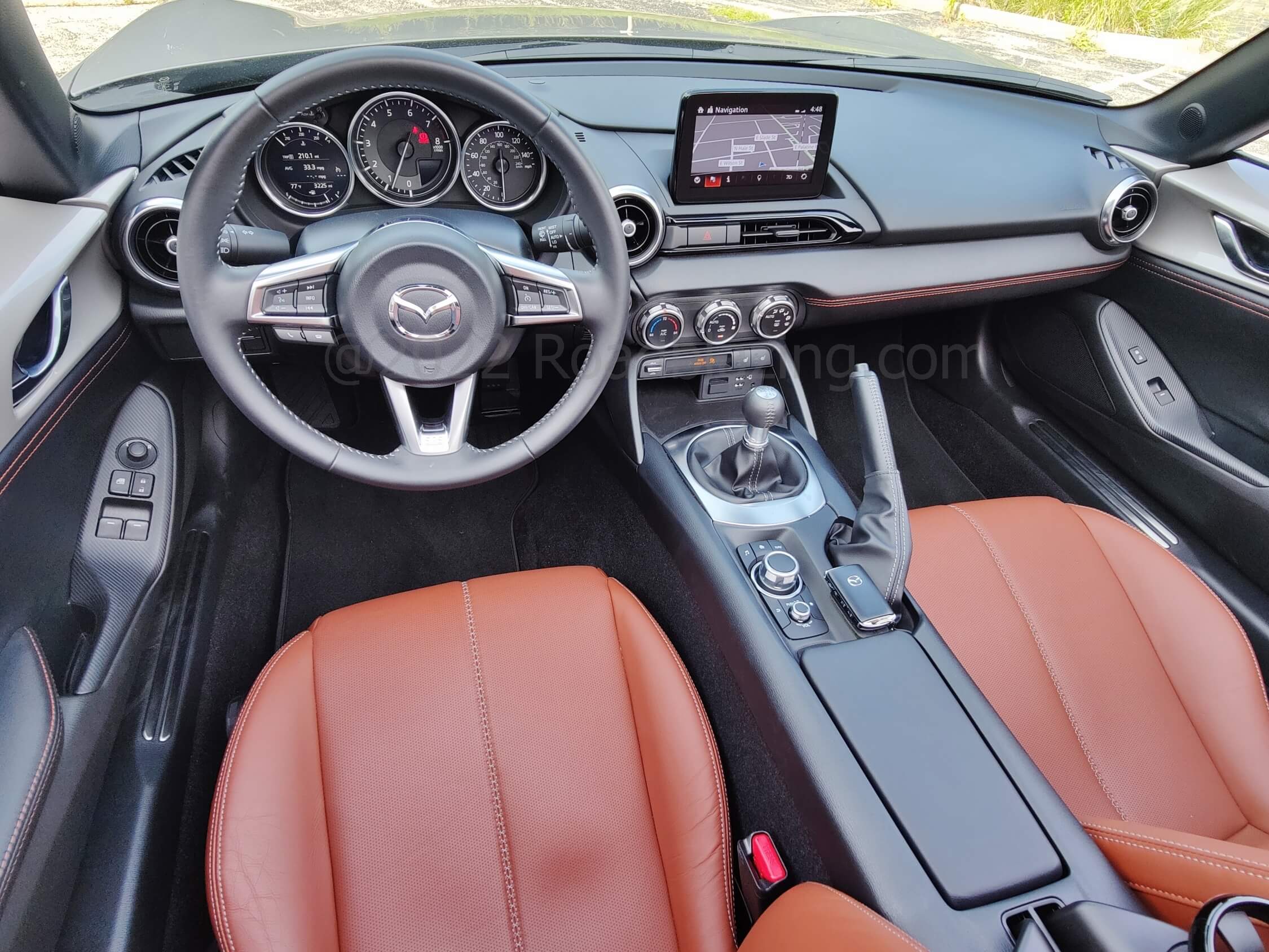 2022 Mazda MX-5 Miata RF: Think classic 1960's British roadster with modern accoutrements for that Jinb Ittai "Rider with Steed" experience.