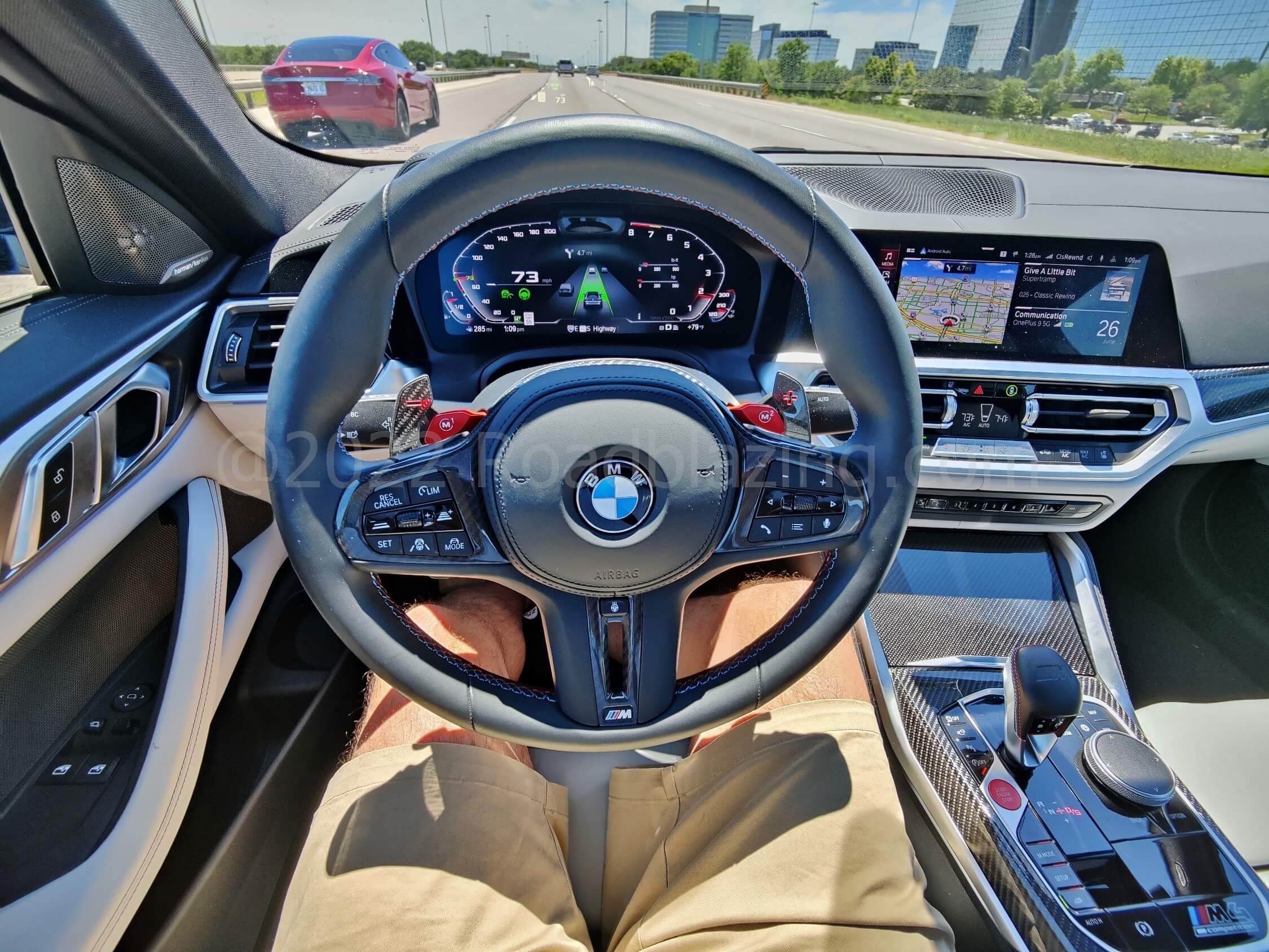 2022 BMW M4 Competition xDrive: 12.3" Live Cockpit Pro shows adaptive cruise control. lane keep assist, adjacent traffic
