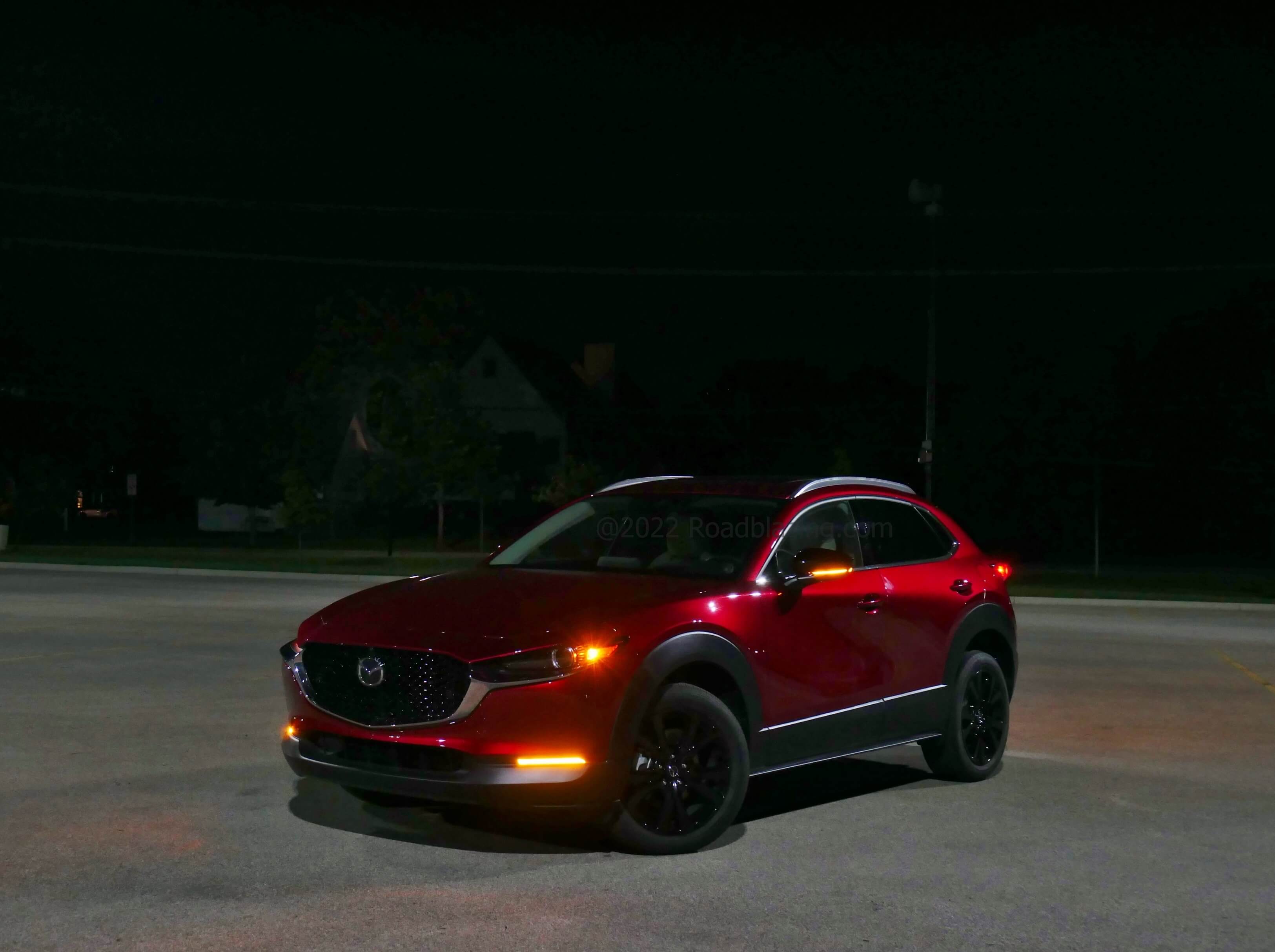 2022 Mazda CX-30 2.5 Turbo AWD: Soul Red Crystal Metallic flows spectacularly sanguine at night