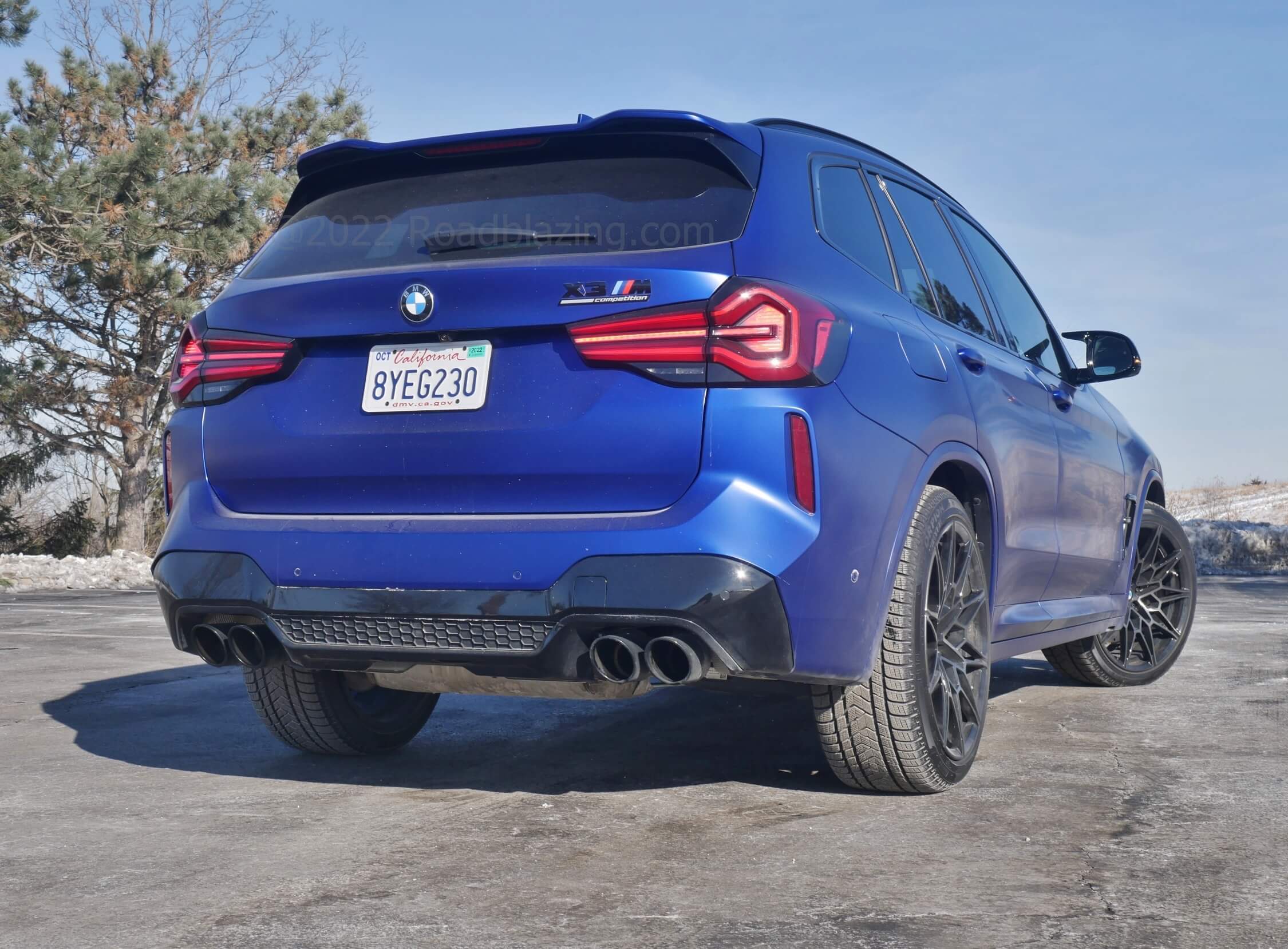 2022 BMW X3 M Competition xDrive: vented roof spoiler & dual twin tailpipe exhaust allow little doubt as to seriously sinister capabilities.