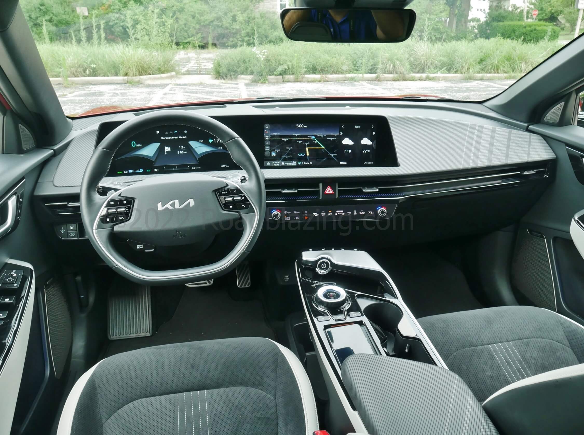 2022 Kia EV6 GT-Line AWD: Dual 12.3" instrument cluster & infotainment screens dominate business casual cabin environment