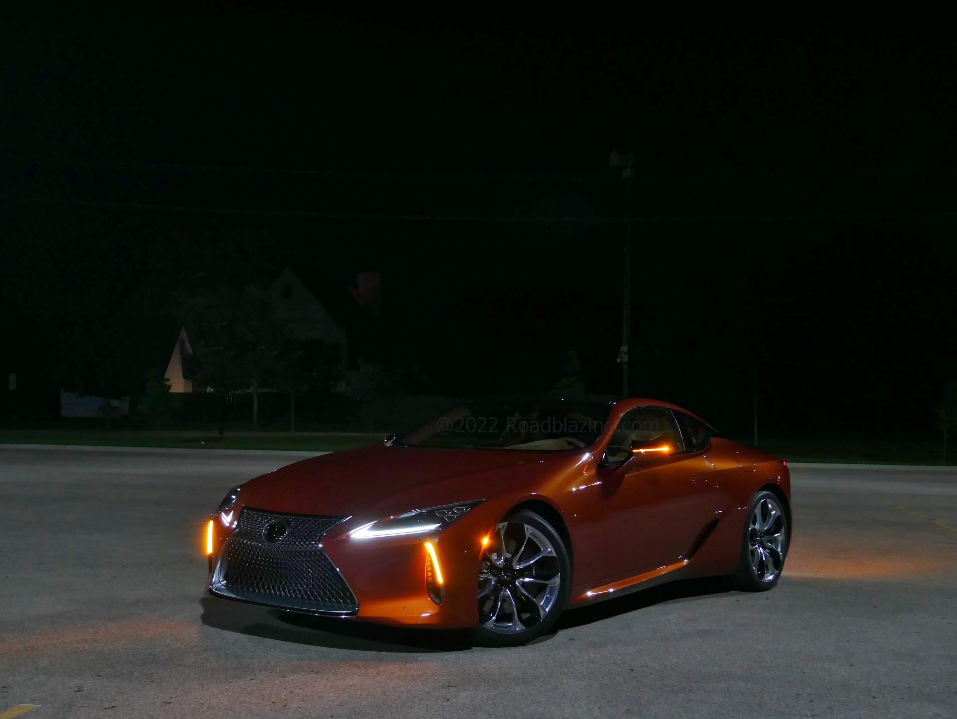 2022 Lexus LC 500: Cadmium Orange flagship coupe at night
