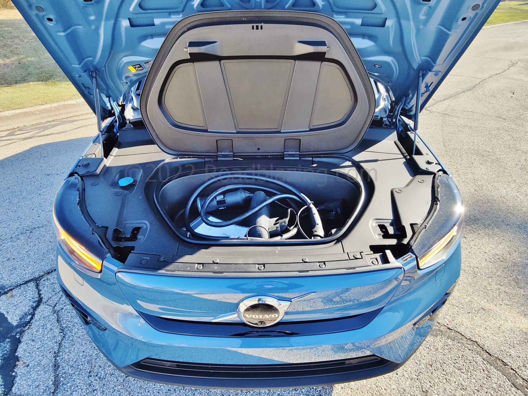 2022 Volvo C40 Recharge Twin Ultimate EV: frunk or "Front Trunk" fits Level 1 charging cable and a small duffel bag.