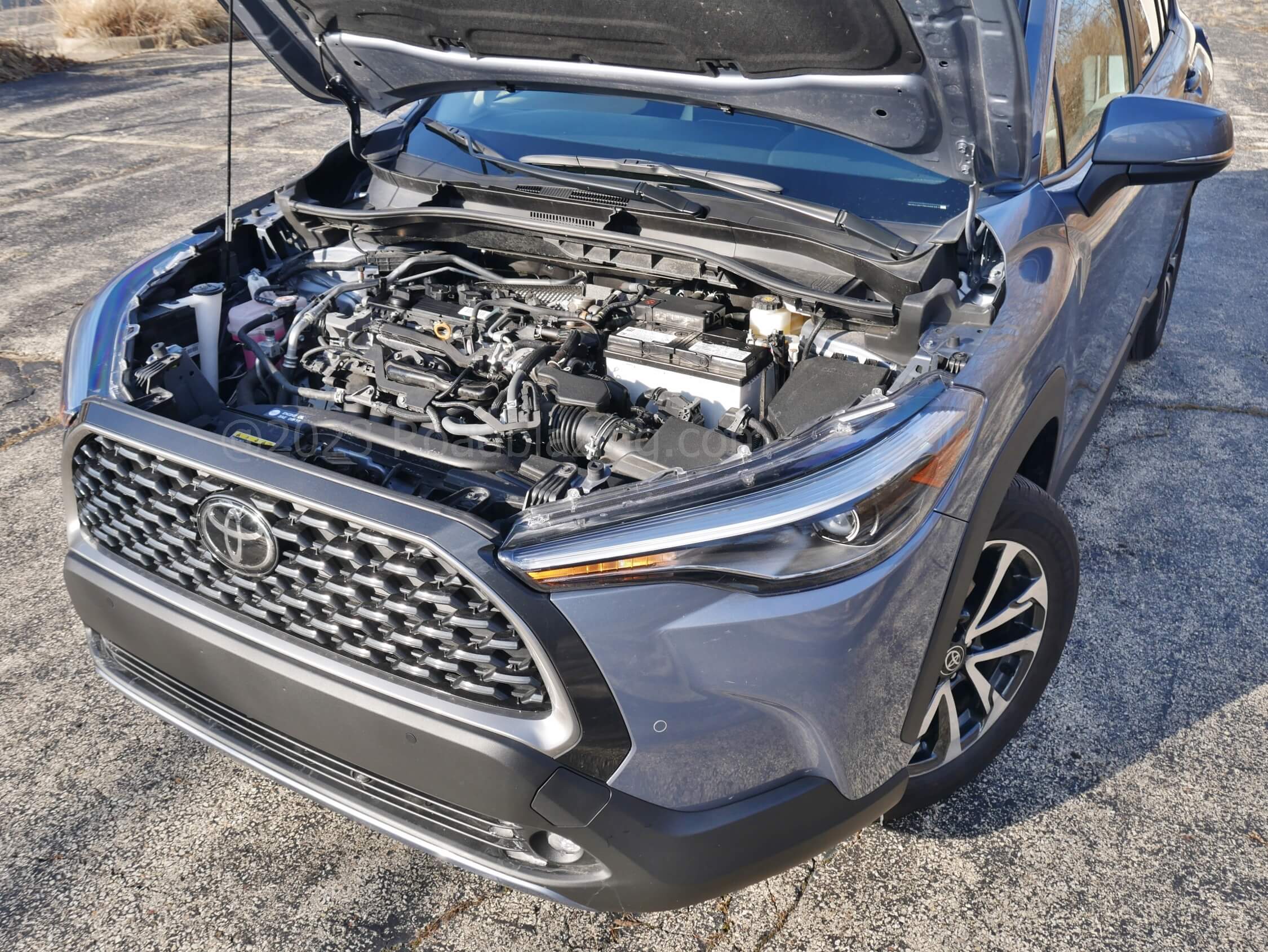 2022 Toyota Corolla Cross XLE AWD: 169 hp twin-cam four pot powerplant gets noisy underway. Mated to CVT and AWD = 27 MPG.