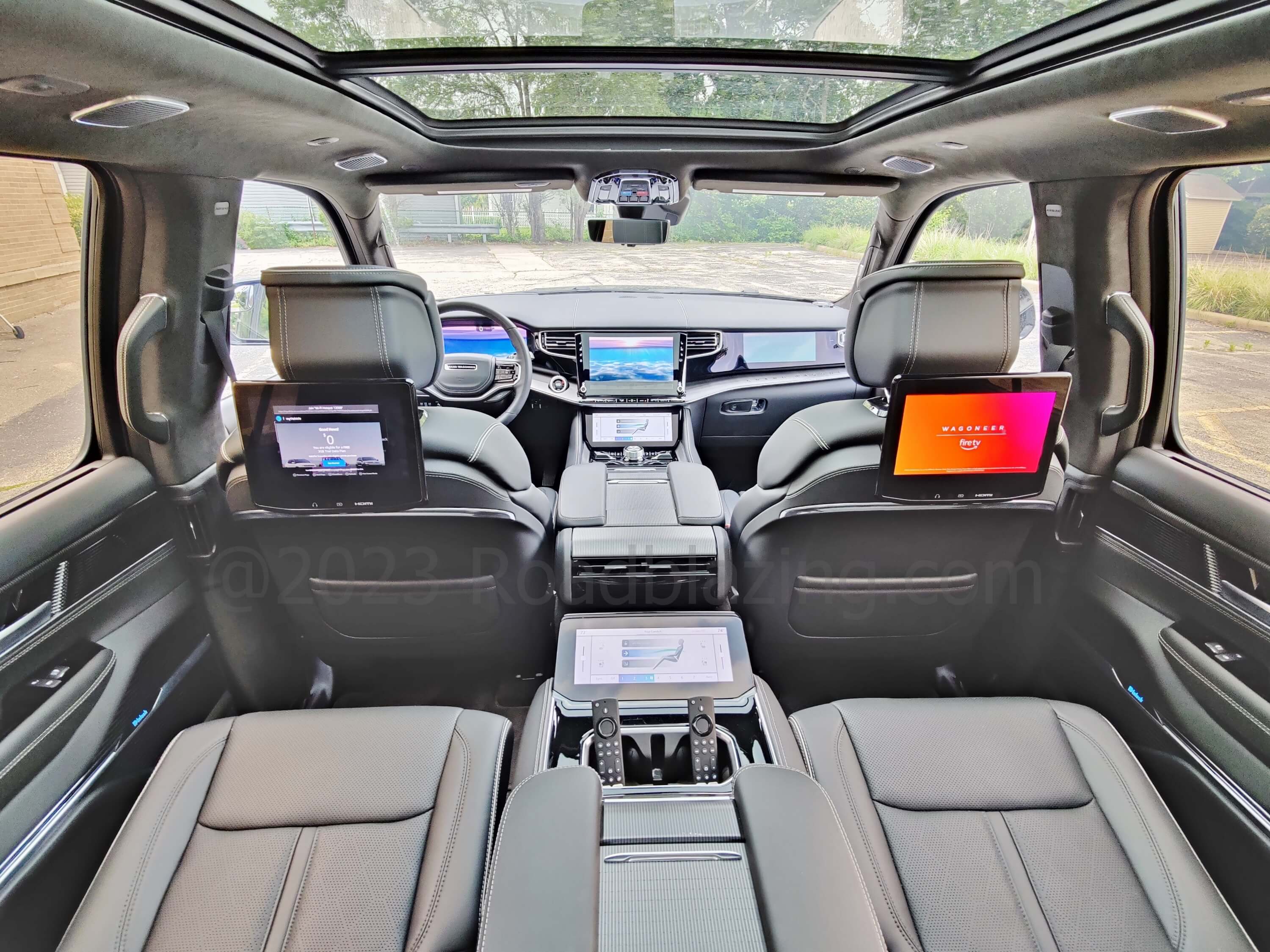 2022 Jeep Grand Wagoneer 6.4L Obsidian 4x4: cabin view forward from Row 2