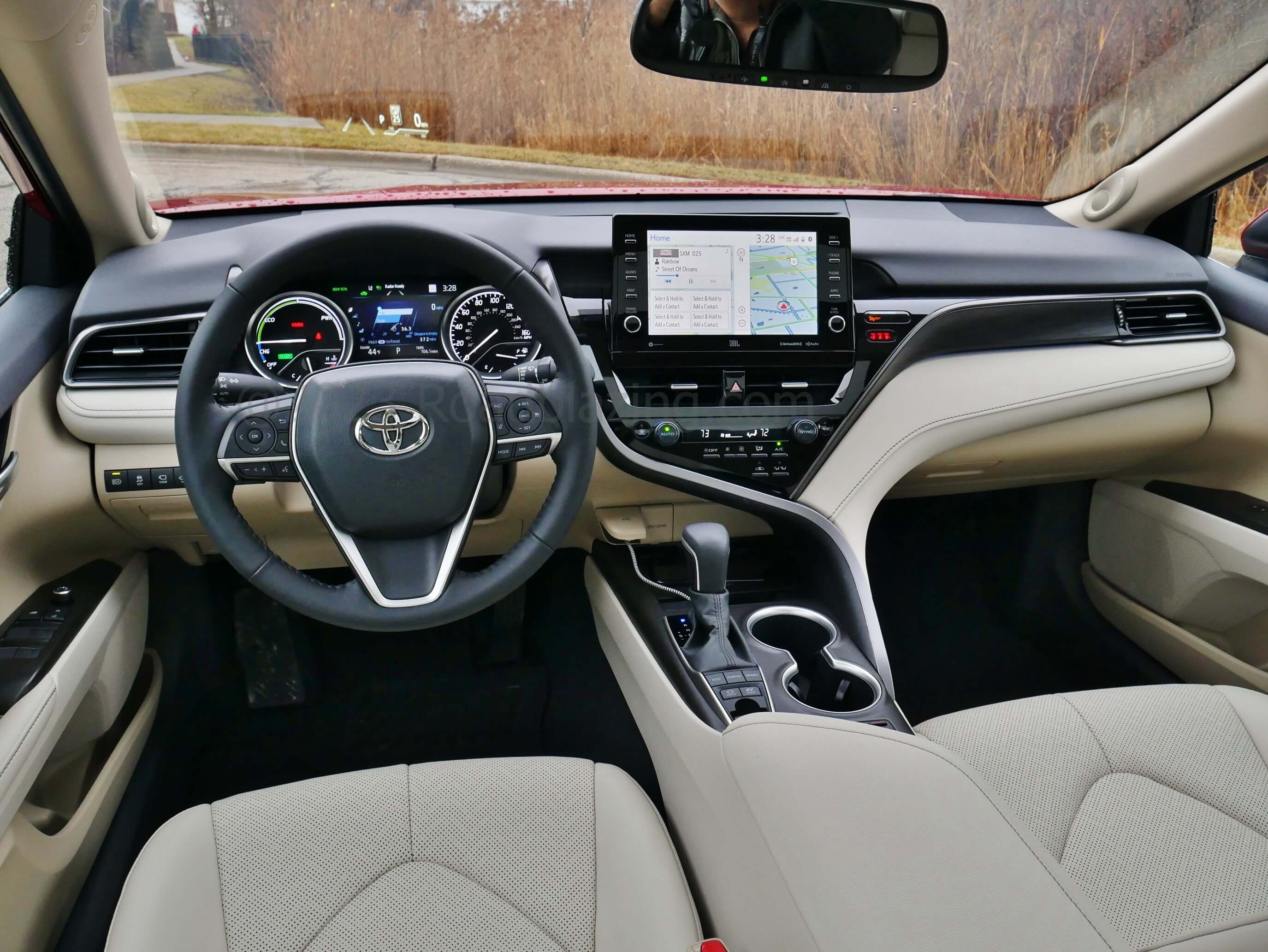 2023 Toyota Camry Hybrid XLE: tried and true blend of ELD twin analog gauges, pod mount touch media display in a soothing contrasted setting.