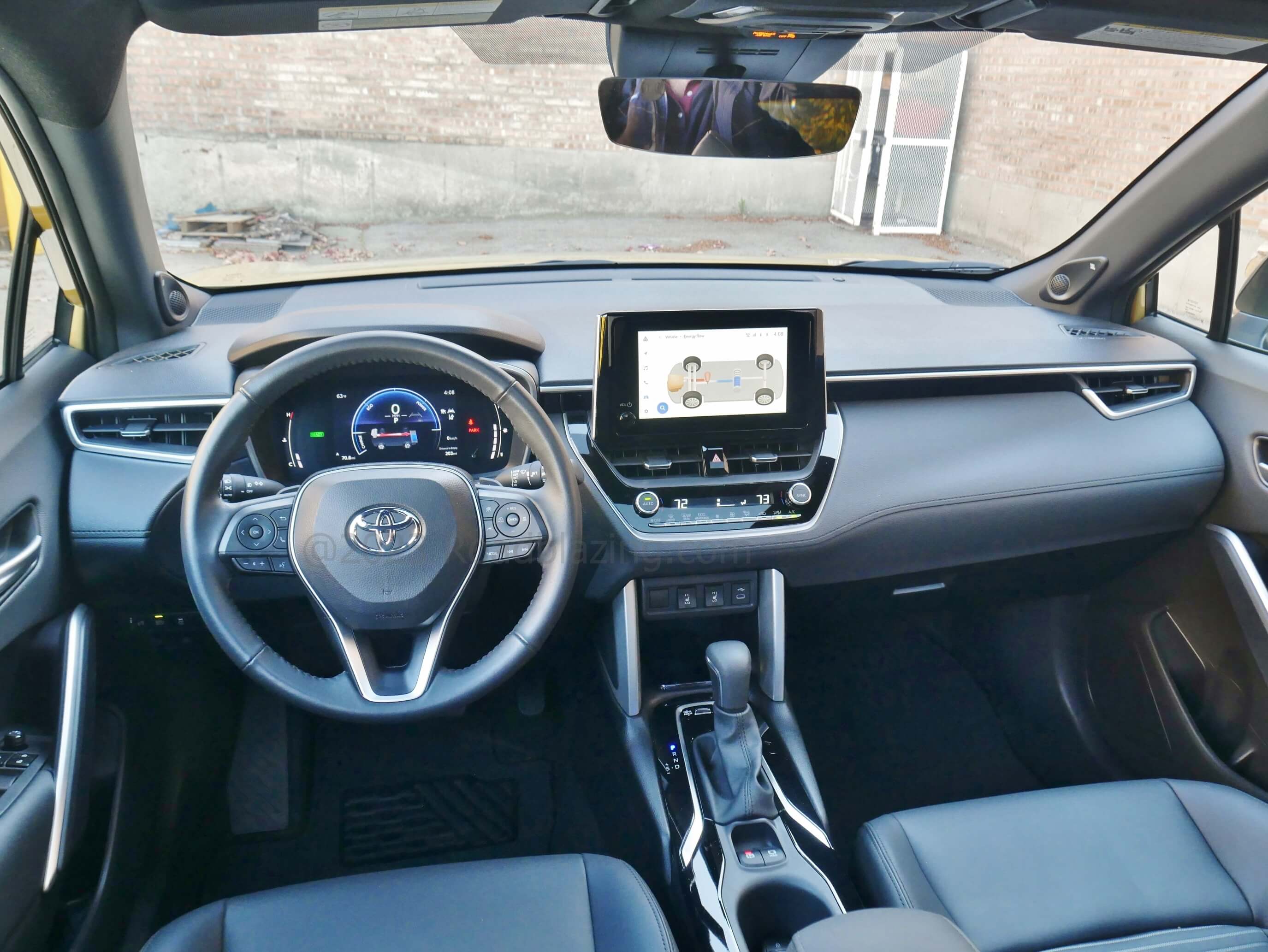 2023 Toyota Corolla Cross Hybrid XSE AWD: Instrument cluster and media displays of hybrid & all wheel drive power flow