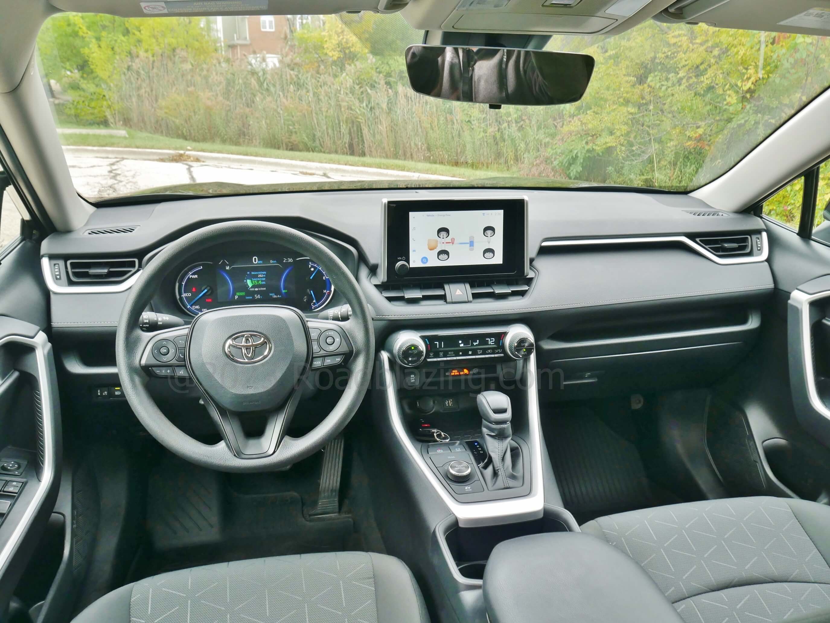 2023 Toyota RAV4 Hybrid AWD Woodland Edition: layered dashboard w/ color displays + knurled oversized climate knobs